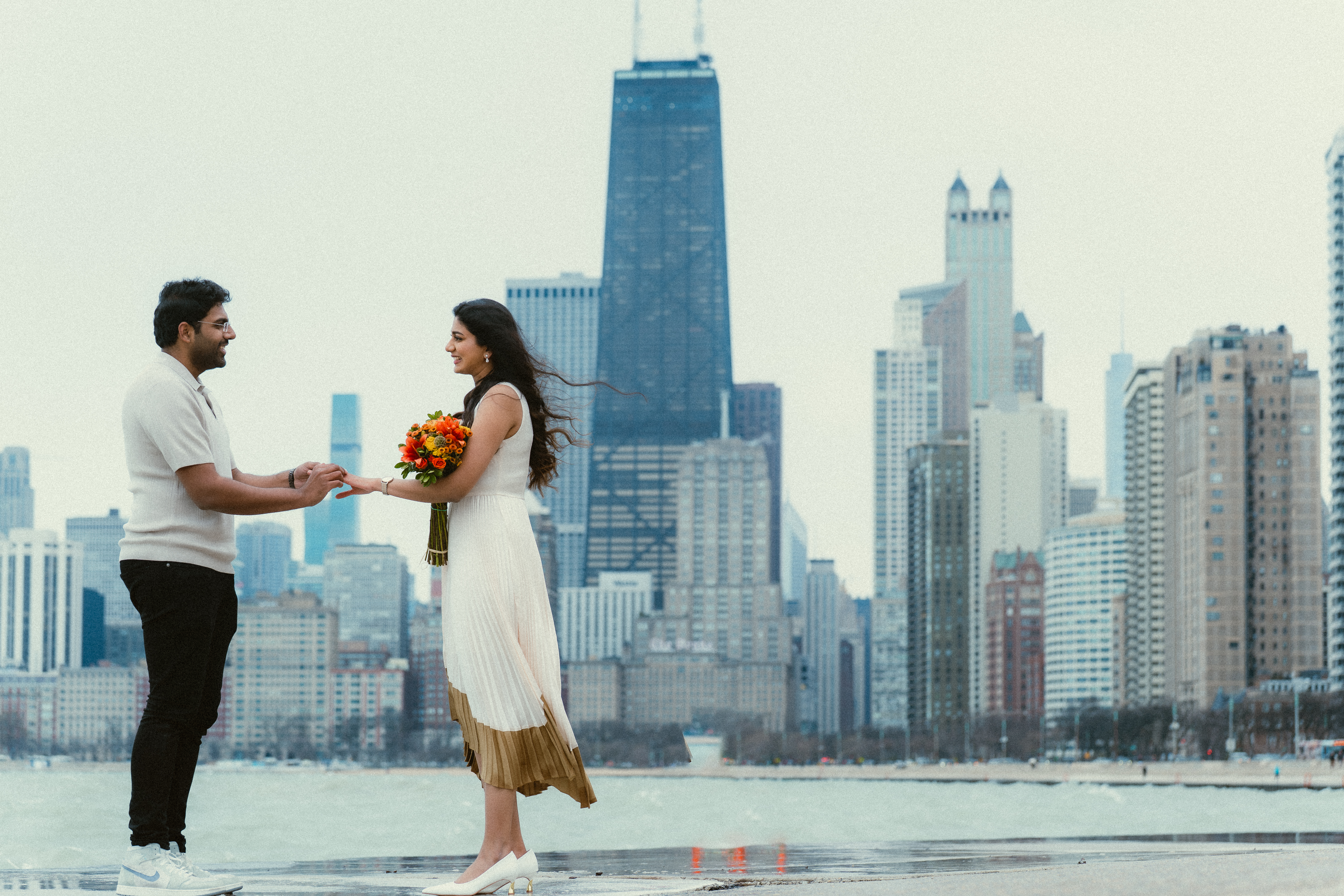Akhila & Subhash share a quiet moment along the Riverwalk, Chicago.