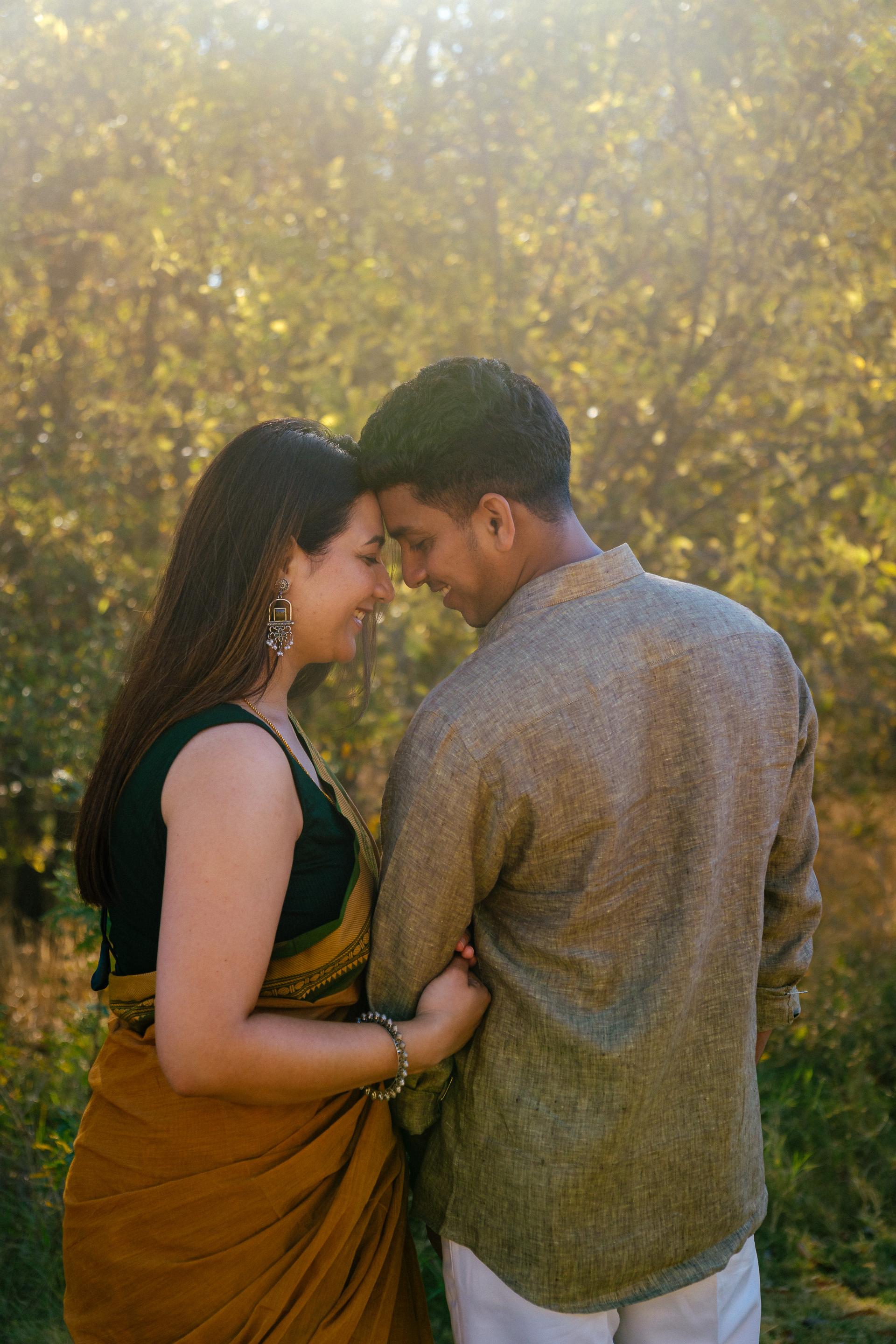 Anuradha & Suresh in an elegant studio portrait.