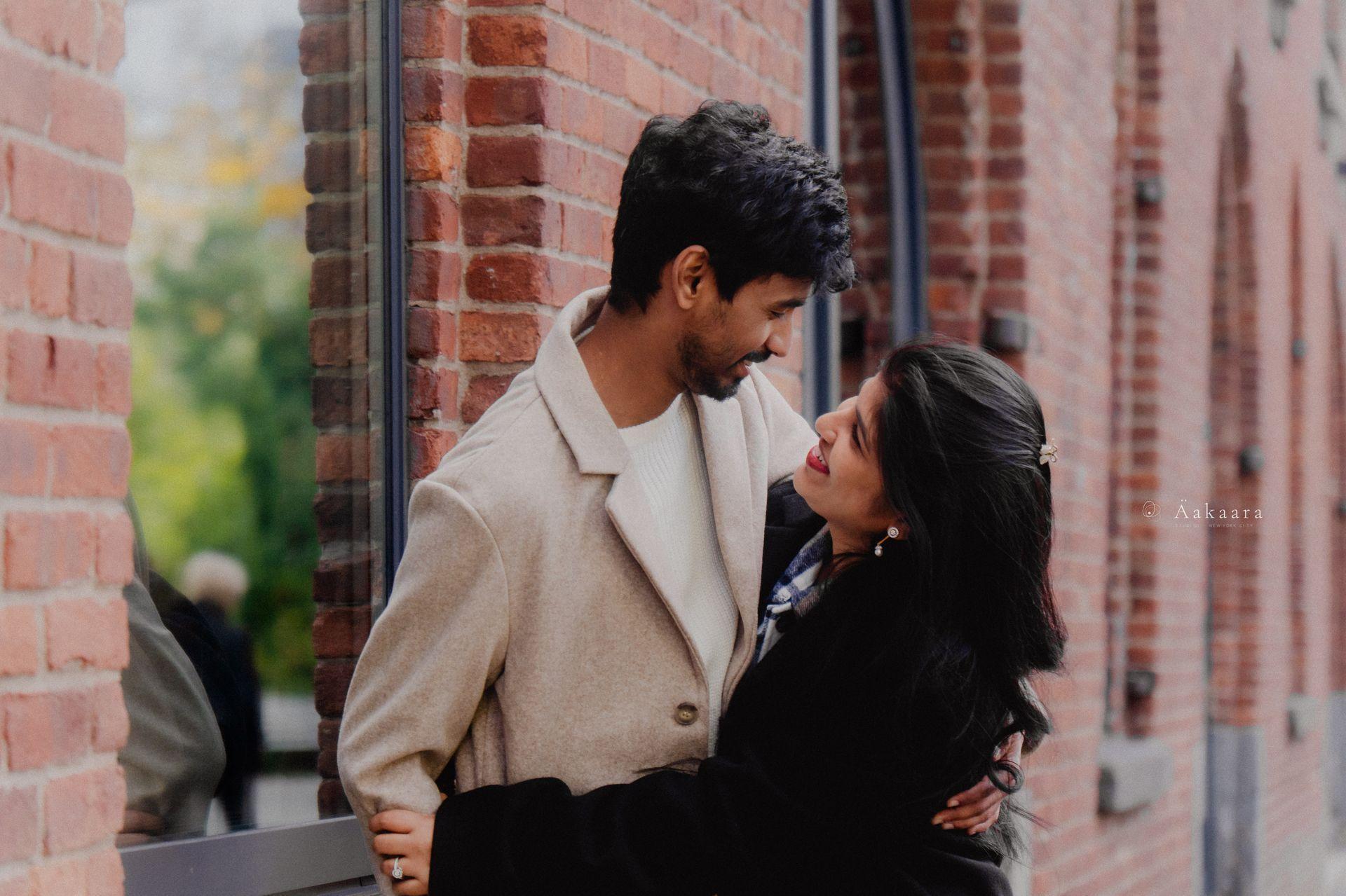 Arvind & Nikhila in a warm editorial portrait.
