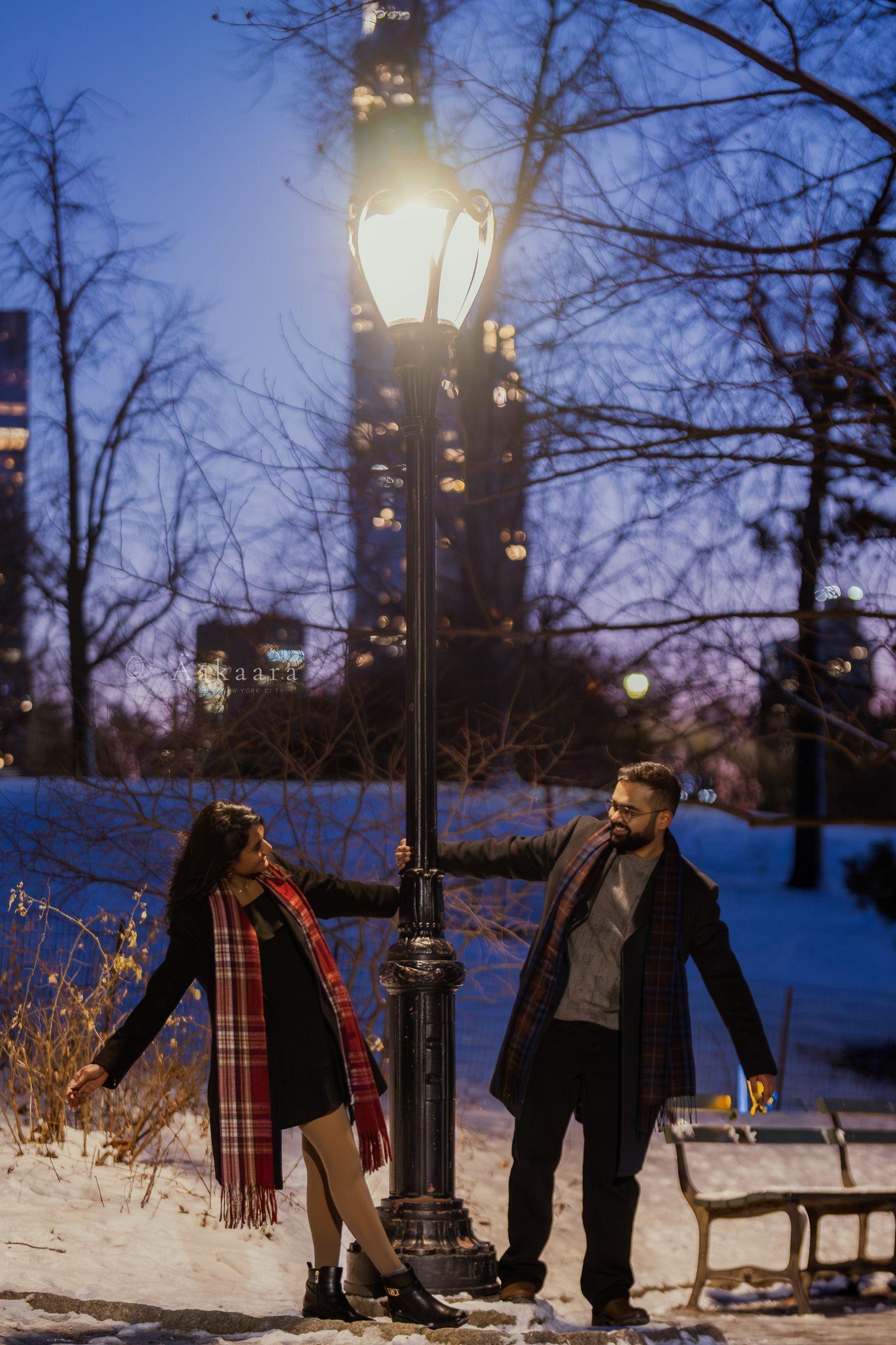 Sachin & Poojitha photographed by Aakaara Studios at the Brooklyn Bridge.